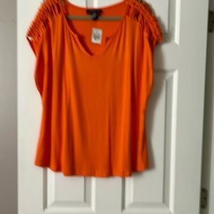 I have this top that I love so much but it doesn’t fit. Ashley Stewart.